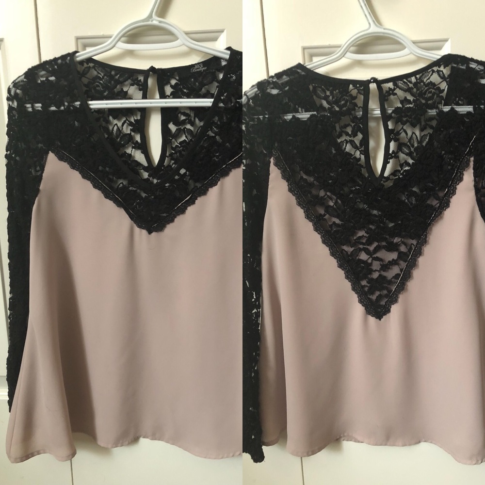 Cute blouse! Runs a little big.